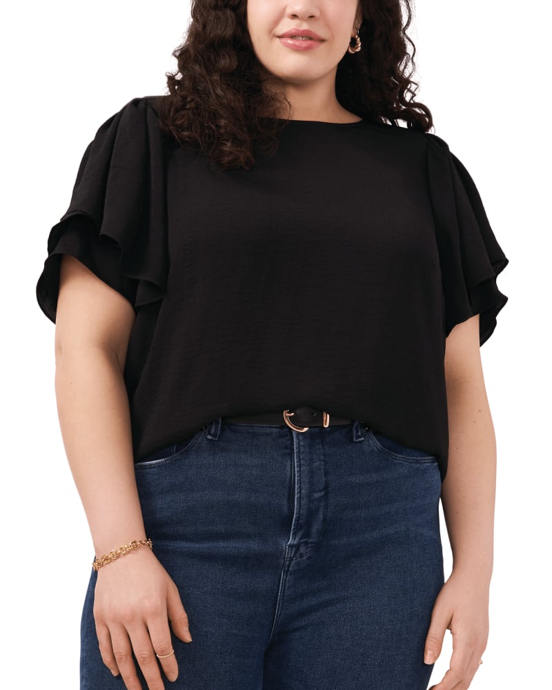 Front of a model wearing a size 1X Skylar Tiered Blouse in RICH BLACK by Vince Camuto. | dia_product_style_image_id:261245